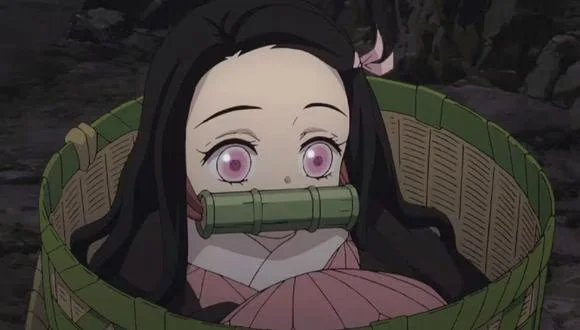 Por que a Nezuko tem um bambu na boca!